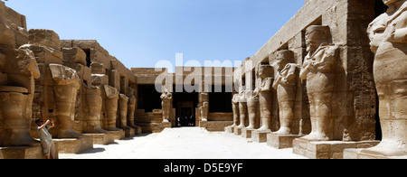 Luxor. Egypt. Theatrical porticoed courtyard with Osiris columns in the Temple of Ramses III at the Temple of Amun in Karnak. Stock Photo