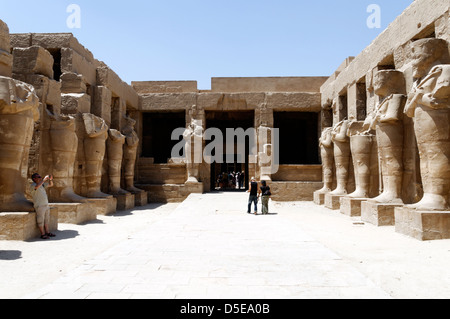 Luxor. Egypt. Theatrical porticoed courtyard with Osiris columns in the Temple of Ramses III at the Temple of Amun in Karnak. Stock Photo