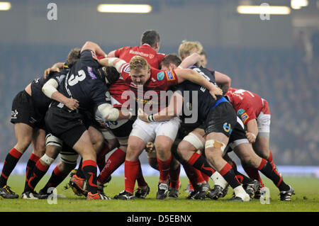 RaboDirect Pro 12 - Newport Gwent Dragons v Scarlets at the Millennium Stadium in Cardiff : Scarlets Samson Lee in the thick of the action. Stock Photo