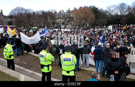 Edinburgh, Scotland, UK. 30th March 2013. Demonstrators gather to protest against a cut to housing benefit for  those living in social housing accommodation with extra rooms. Stock Photo