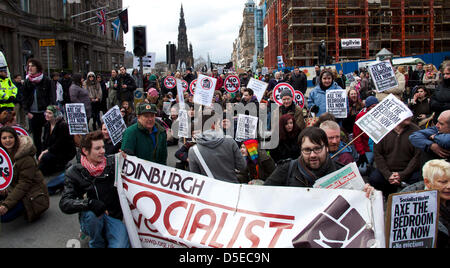 Edinburgh, Scotland, UK. 30th March 2013. Demonstrators gather to protest against a cut to housing benefit for  those living in social housing accommodation with extra rooms. Stock Photo