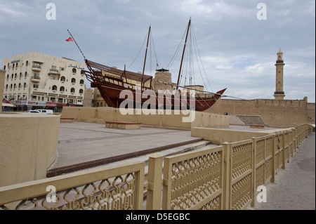 An old traditional arabic boat (dhow) outside Dubai Museum, Dubai, United Arab Emirates. Stock Photo