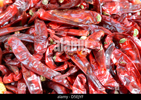 pile of spicy peppers at a market Stock Photo