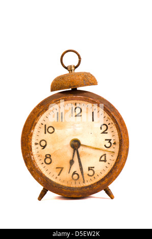 ancient grunge and rusted alarm-clock isolated on white Stock Photo