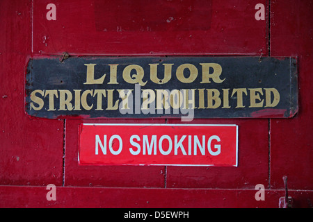 A noticeboard indicating No Smoking, Liquor Strictly Prohibited Stock Photo