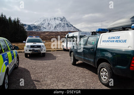 Glencoe, UK. 31st March 2013. Mountain rescue teams from Scotland resume their search for the missing skier on Glencoe mountain resort. The skier had gone off piste and was caught in an avalanche.The search was based at King's House Hotel, opposite the mountain resort. A Helicopter was used to ferry searchers back and forth. Stock Photo