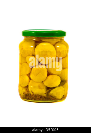 potted yellow pattypan squash in glass jar isolated on white Stock Photo