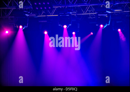 Red spotlights on empty stage Stock Photo