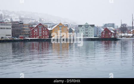 Scandanavian buildings reflected in the water on a winters day. Stock Photo