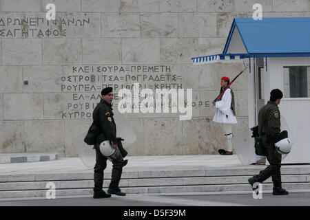 Athens, Greece. 31st March, 2013. Riot police take a position, during ...