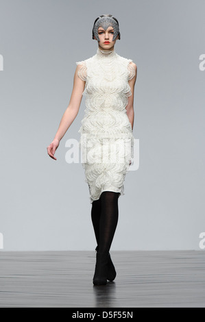 A model wears a design from the Bora Aksu collection during London Fashion Week. Stock Photo