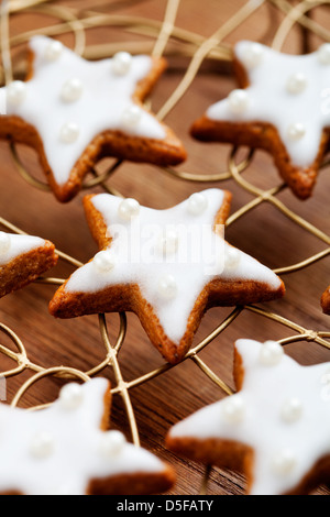 Baking star shape christmas cookies, selective focus Stock Photo