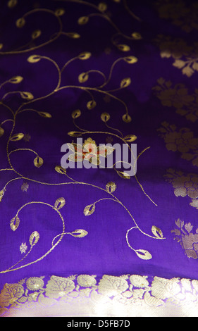 Indian Crafts Embroidery in gold thread on hand woven silk sari fabric from  Mysore Karnataka detail Stock Photo - Alamy