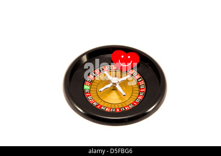 roulette toy with red heart isolated on white background Stock Photo
