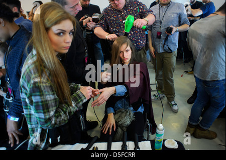 A model is prepared ahead of the Paul Smith collection during London Fashion Week. Stock Photo