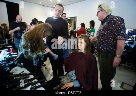 A model is prepared ahead of the Paul Smith collection during London Fashion Week. Stock Photo