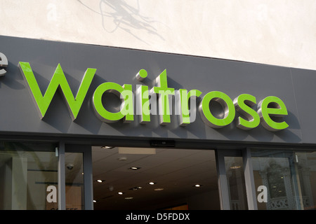 Waitrose supermarket sign logo on storefront UK  KATHY DEWITT Stock Photo