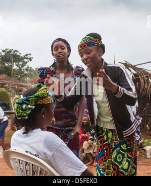 Young Muslim women doing a skit to show what they have learned about HIV/AIDS prevention and care in Cameroon near Bamenda Stock Photo