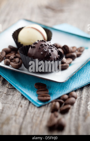 Close up of chocolate pralines with shallow focus Stock Photo