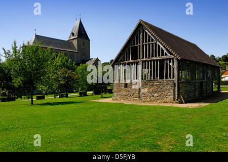 Traditional cider press building in the grounds of Lonlay l'Abbaye, Normandy, France Stock Photo