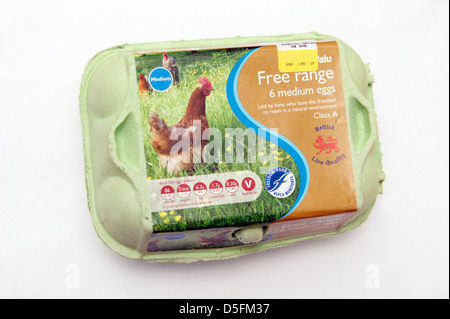 A box of free range eggs with the RSPCA freedom food logo / sign & nutritional contents labelling Stock Photo