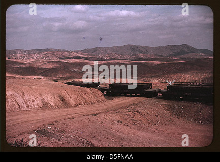 A train bringing copper ore out of the mine, Ducktown, Tennessee. Fumes ...