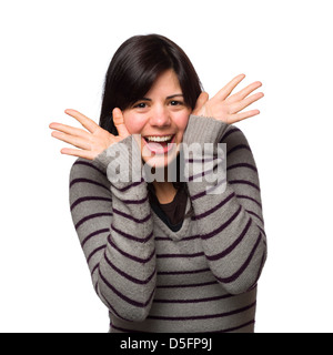 Portrait of a surprised young woman with hands on head looking at camera in disbelief Stock Photo