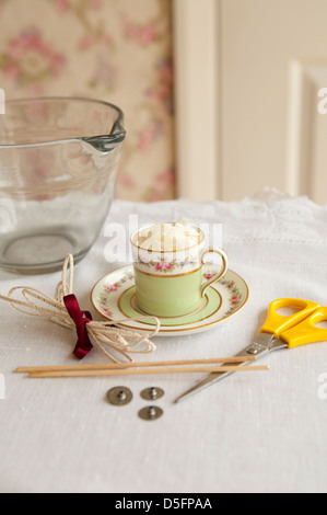 Tea cup candle making equipment step-by-step 1 Stock Photo