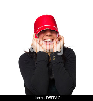 Goofy portrait of a woman wearing a red hat isolated on white background Stock Photo
