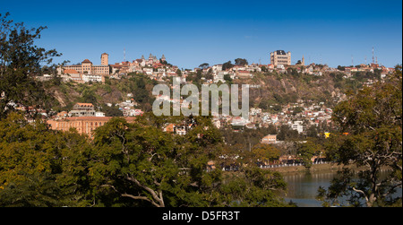 Madagascar, Antananarivo, Haute Ville, Royal Palace on city skyline above Lake Anosy Stock Photo