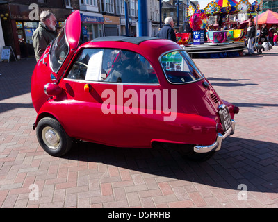 A beautifully restored BMW Isetta bubble car on display in Redcar High Street March 2013 Stock Photo