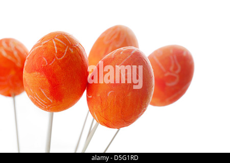 Orange easter egg decorations isolated on white Stock Photo