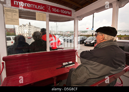 Isle of Man, Douglas, Central Promenade, passengers on horse drawn tram Stock Photo