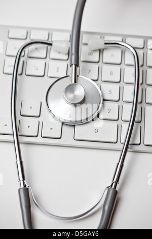 Stethoscope on keyboard Stock Photo - Alamy