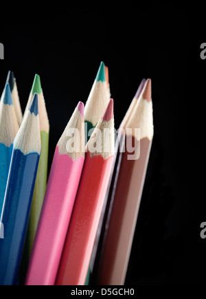 Set of color pencils on black isolated background Stock Photo