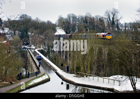 The Llangollen Canal aqueduct and the railway viaduct (with class 66 freight train), at Chirk on the Shropshire border with Wales, UK. Stock Photo