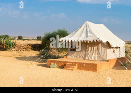 Tent in camping site hotel for tourist in the thar desert under blue sky Stock Photo