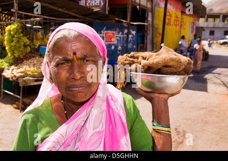 Hindu woman in marketplace in Paud Mulshi Valley Pune Maharashtra India Stock Photo