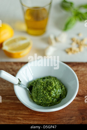 Basil pesto with ingredients Stock Photo