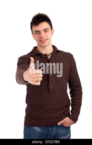 Young man showing thumbs up sign Stock Photo