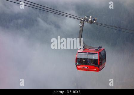 British Columbia, Whistler. Peak to Peak Gondola coming out of the clouds. Stock Photo