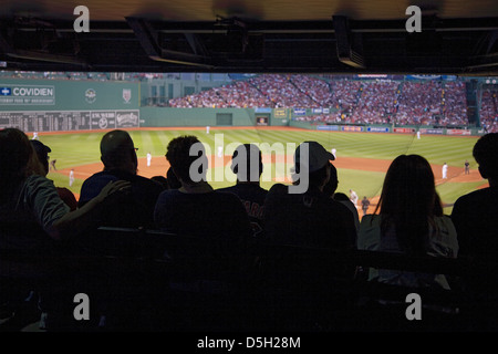 Silhouette crowd watches baseball game historic Fenway Park Boston Red Sox Boston Ma. USA May 20 2010 Red Sox versus Minnesota Stock Photo