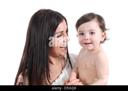 Portrait of a beautiful mother holding her daughter laughing isolated on a white background Stock Photo