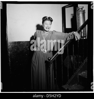 A portrait of Ella Fitzgerald, one of the most famous jazz singers, captured in New York around November 1946. This image reflects her influence on the music industry during the mid-20th century. Stock Photo