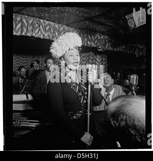 A 1947 portrait of jazz musicians Ella Fitzgerald, Dizzy Gillespie, Ray Brown, Milt Jackson, and Timmie Rosenkrantz, taken in New York City. The image captures a moment in jazz history, featuring some of the genre's most influential artists. Stock Photo