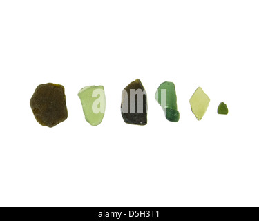 Six pieces of bright green and dark green sea glass found on the coast of Maine. Stock Photo