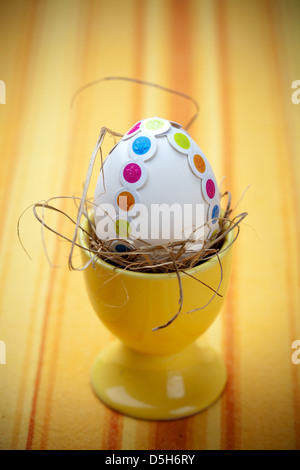 Easter egg with colorful decorations, selective focus Stock Photo