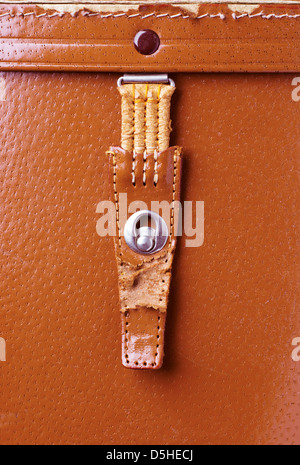 metal lock old orange leather briefcase Stock Photo