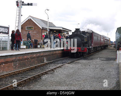 N.C.B. steam loco and BR Mk 1 coaches loading passengers at Ludborough for travel to North Thoresby,Lincs Wolds Railway Easter G Stock Photo