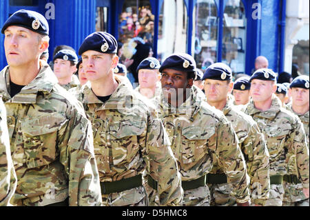 Ripon, North Yorkshire, UK. Wednesday 3rd April 2013. Members of 21 Engineer Regiment April through Ripon to mark their homecoming from a six month tour of Afghanistan. Whilst in Afghanistan the 21 Regiment made their own version of Gangnam Style which went viral on Youtube. Credit:ANDRYPHOT / Alamy Live News Stock Photo